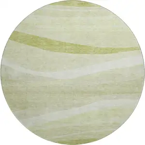 Photo of 8' Artichoke Green And Ivory Abstract Washable Round Rug With UV Protection