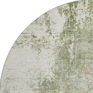 Photo of 8' Artichoke Green And Ivory Abstract Washable Round Rug With UV Protection