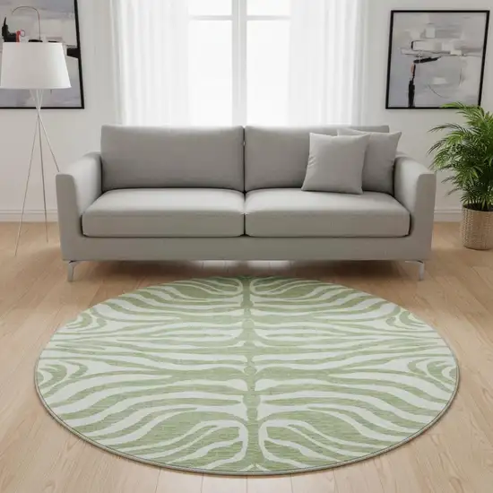 8' Artichoke Green And Ivory Animal Print Washable Round Rug With UV Protection Photo 2
