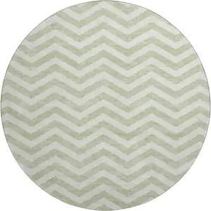 Photo of 8' Artichoke Green And Ivory Chevron Washable Round Rug With UV Protection