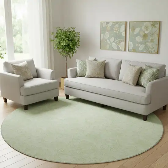 8' Artichoke Green And Ivory Floral Washable Round Rug With UV Protection Photo 1