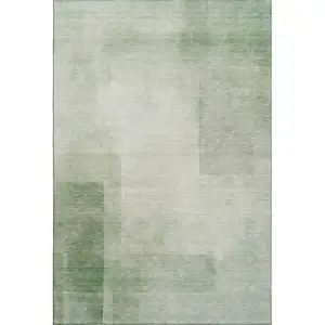 Photo of 8' Artichoke Green And Ivory Geometric Washable Area Rug With UV Protection