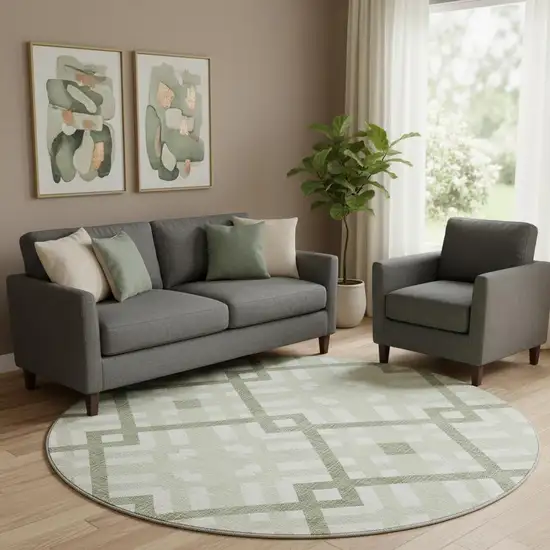 8' Artichoke Green And Ivory Geometric Washable Round Rug With UV Protection Photo 1