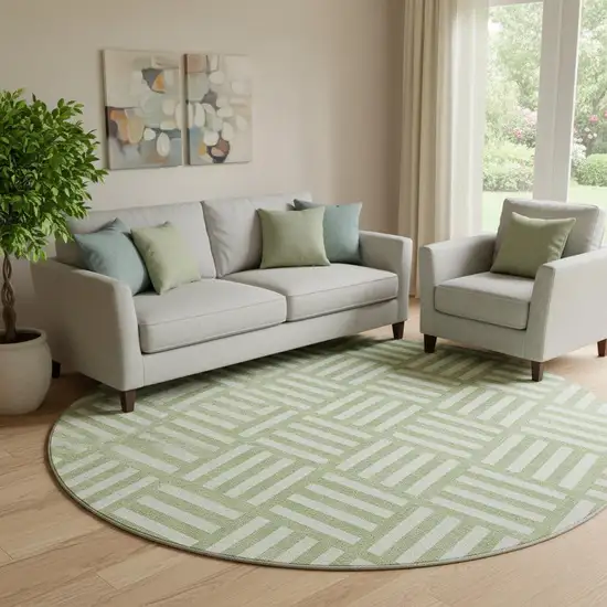 8' Artichoke Green And Ivory Geometric Washable Round Rug With UV Protection Photo 1