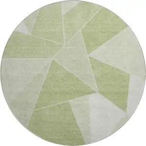 Photo of 8' Artichoke Green And Ivory Geometric Washable Round Rug With UV Protection