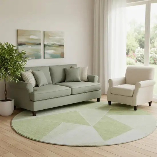 8' Artichoke Green And Ivory Geometric Washable Round Rug With UV Protection Photo 1
