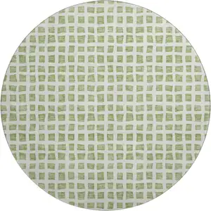 Photo of 8' Artichoke Green And Ivory Geometric Washable Round Rug With UV Protection