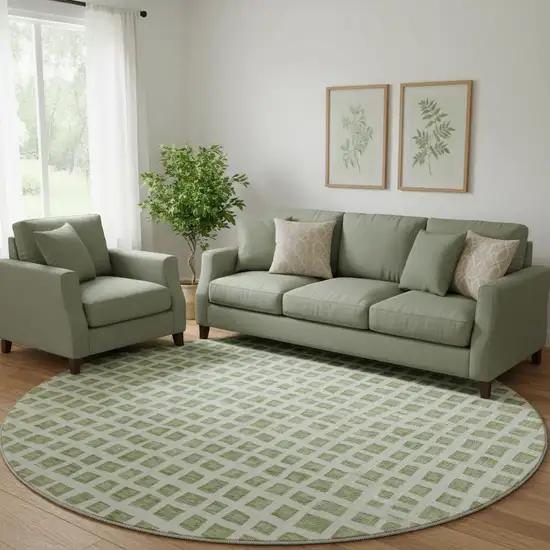 8' Artichoke Green And Ivory Geometric Washable Round Rug With UV Protection Photo 1