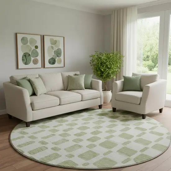8' Artichoke Green And Ivory Geometric Washable Round Rug With UV Protection Photo 1