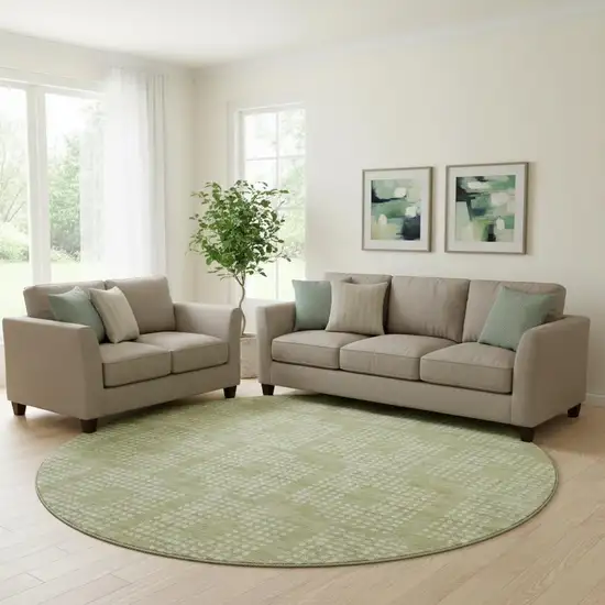 8' Artichoke Green And Ivory Geometric Washable Round Rug With UV Protection Photo 1