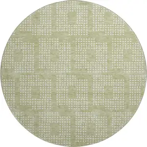 Photo of 8' Artichoke Green And Ivory Geometric Washable Round Rug With UV Protection