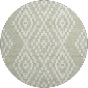 Photo of 8' Artichoke Green And Ivory Geometric Washable Round Rug With UV Protection