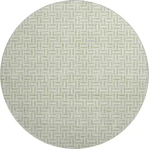 Photo of 8' Artichoke Green And Ivory Geometric Washable Round Rug With UV Protection