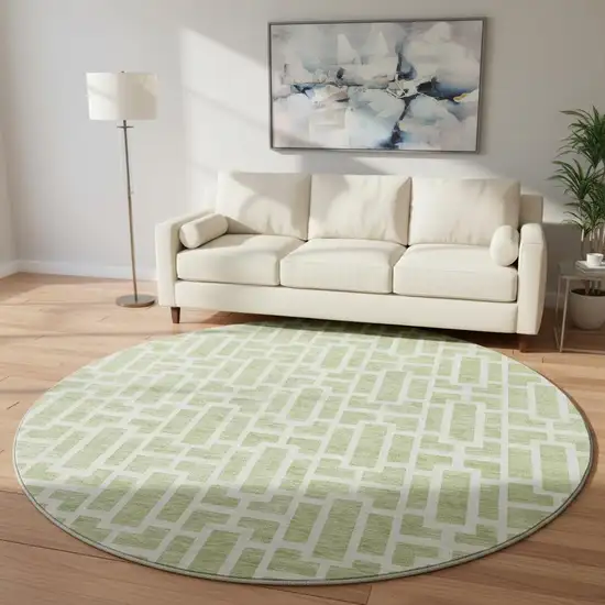 8' Artichoke Green And Ivory Geometric Washable Round Rug With UV Protection Photo 2