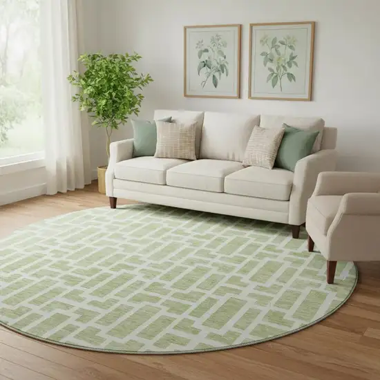 8' Artichoke Green And Ivory Geometric Washable Round Rug With UV Protection Photo 1