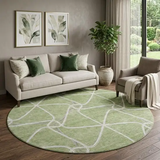 8' Artichoke Green And Ivory Geometric Washable Round Rug With UV Protection Photo 1