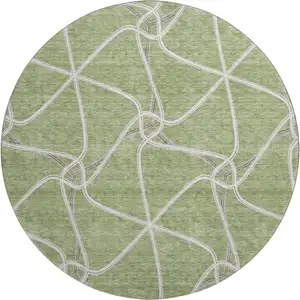 Photo of 8' Artichoke Green And Ivory Geometric Washable Round Rug With UV Protection