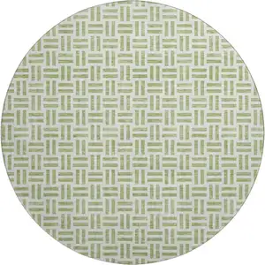 Photo of 8' Artichoke Green And Ivory Geometric Washable Round Rug With UV Protection