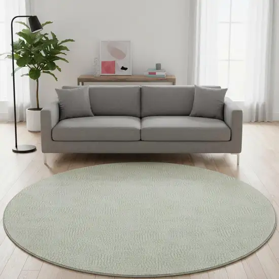 8' Artichoke Green And Ivory Geometric Washable Round Rug With UV Protection Photo 2