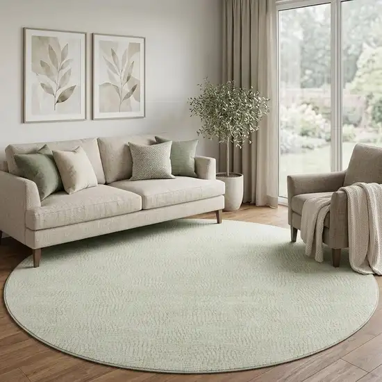 8' Artichoke Green And Ivory Geometric Washable Round Rug With UV Protection Photo 1