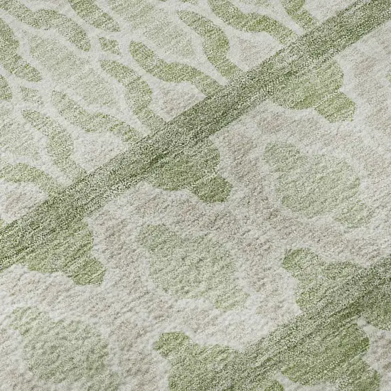 8' Artichoke Green And Ivory Ikat Washable Round Rug With UV Protection Photo 9