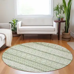 Photo of 8' Artichoke Green And Ivory Ikat Washable Round Rug With UV Protection