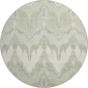 Photo of 8' Artichoke Green And Ivory Ikat Washable Round Rug With UV Protection