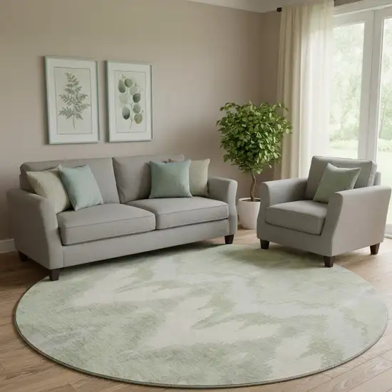 8' Artichoke Green And Ivory Ikat Washable Round Rug With UV Protection Photo 1