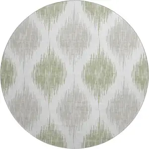 Photo of 8' Artichoke Green And Ivory Ikat Washable Round Rug With UV Protection