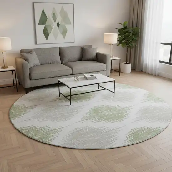8' Artichoke Green And Ivory Ikat Washable Round Rug With UV Protection Photo 2