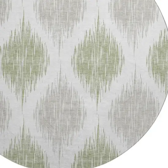 8' Artichoke Green And Ivory Ikat Washable Round Rug With UV Protection Photo 3