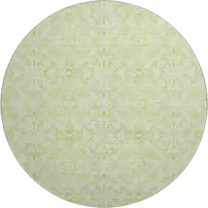 Photo of 8' Artichoke Green And Ivory Medallion Washable Round Rug With UV Protection