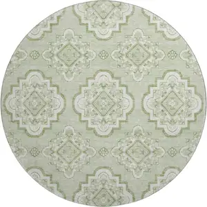 Photo of 8' Artichoke Green And Ivory Medallion Washable Round Rug With UV Protection