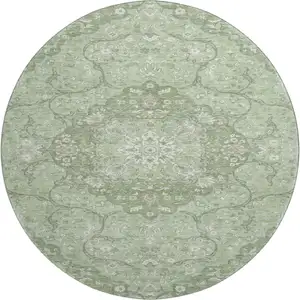 Photo of 8' Artichoke Green And Ivory Medallion Washable Round Rug With UV Protection