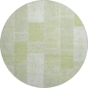 Photo of 8' Artichoke Green And Ivory Patchwork Washable Round Rug With UV Protection