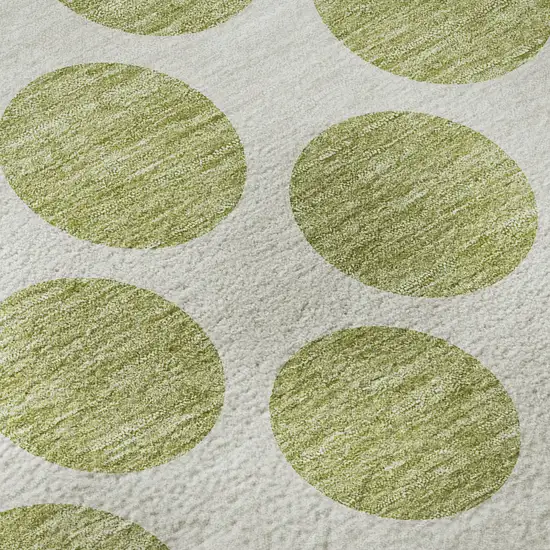 8' Artichoke Green And Ivory Polka Dot Washable Round Rug With UV Protection Photo 8