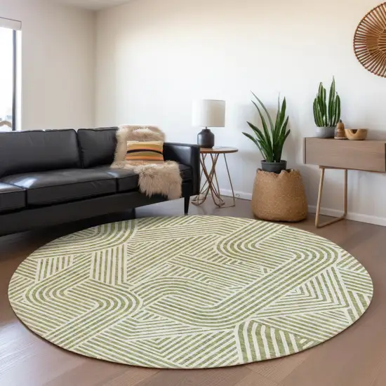 8' Artichoke Green And Ivory Round Abstract Washable Indoor Outdoor Area Rug Photo 7