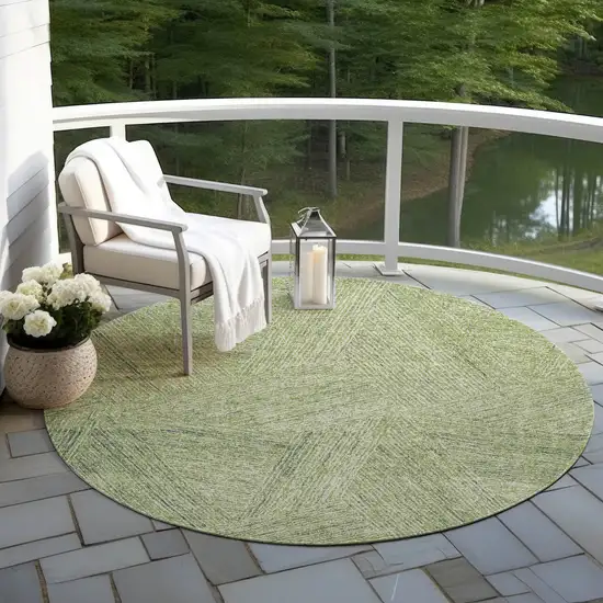 8' Artichoke Green And Ivory Round Abstract Washable Indoor Outdoor Area Rug Photo 5