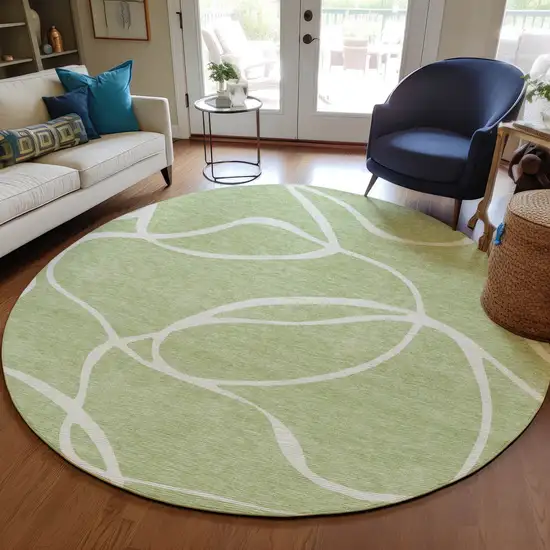 8' Artichoke Green And Ivory Round Abstract Washable Indoor Outdoor Area Rug Photo 8