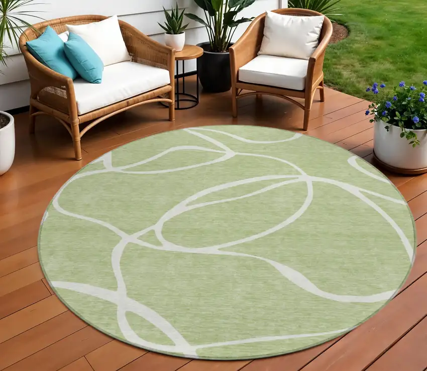 8' Artichoke Green And Ivory Round Abstract Washable Indoor Outdoor Area Rug Photo 1