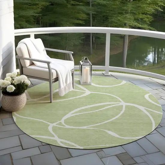 8' Artichoke Green And Ivory Round Abstract Washable Indoor Outdoor Area Rug Photo 7