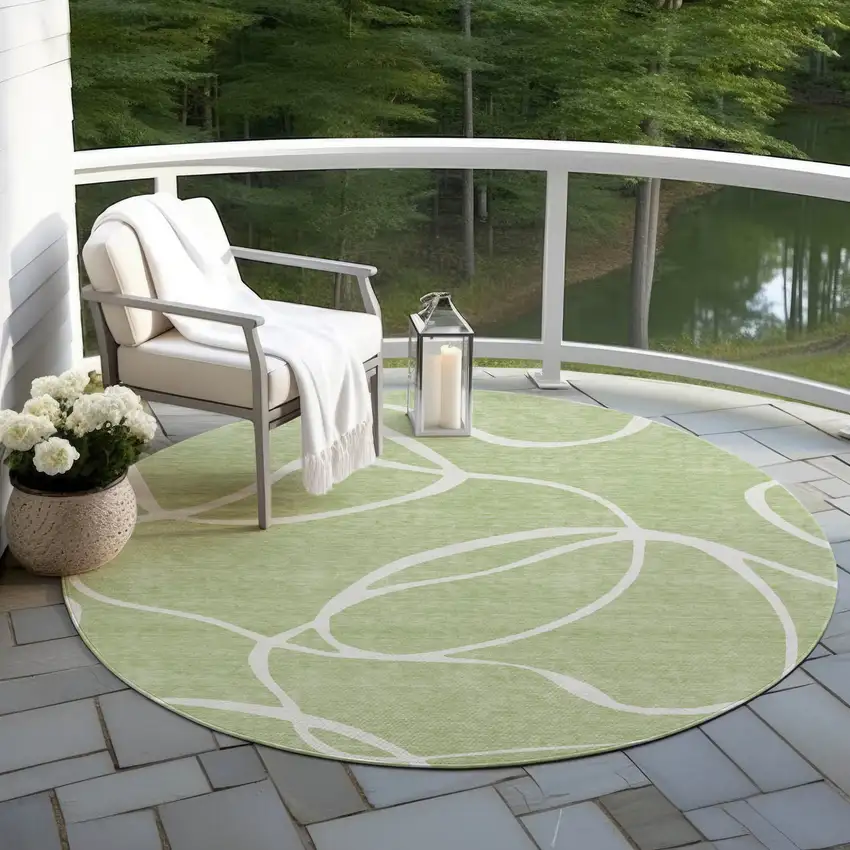 8' Artichoke Green And Ivory Round Abstract Washable Indoor Outdoor Area Rug Photo 7