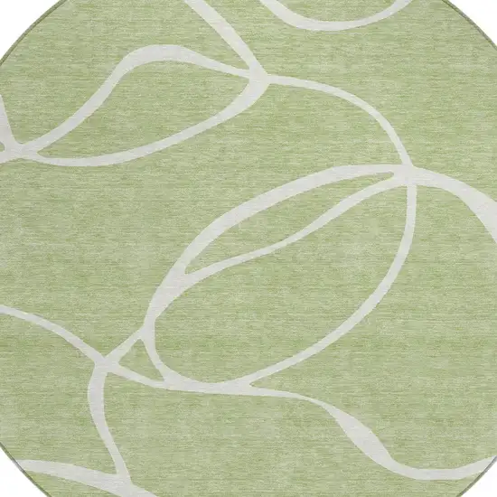 8' Artichoke Green And Ivory Round Abstract Washable Indoor Outdoor Area Rug Photo 4