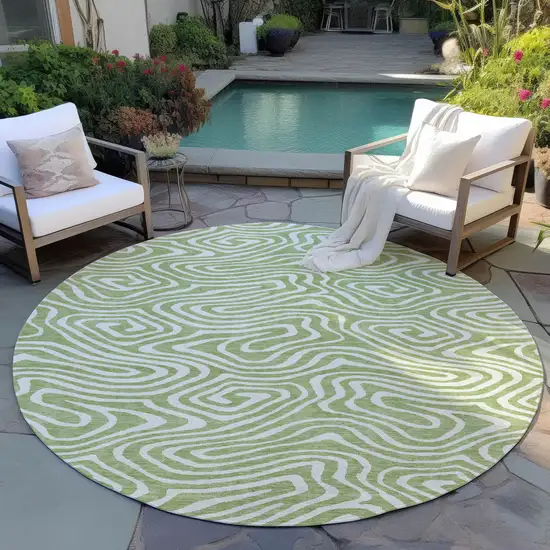 8' Artichoke Green And Ivory Round Abstract Washable Indoor Outdoor Area Rug Photo 6