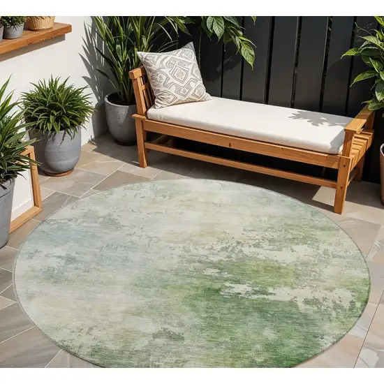 8' Artichoke Green And Ivory Round Abstract Washable Indoor Outdoor Area Rug Photo 1