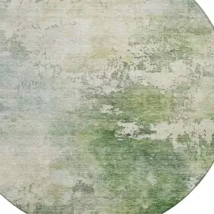 Photo of 8' Artichoke Green And Ivory Round Abstract Washable Indoor Outdoor Area Rug
