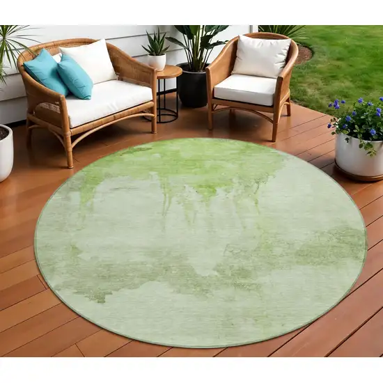 8' Artichoke Green And Ivory Round Abstract Washable Indoor Outdoor Area Rug Photo 2