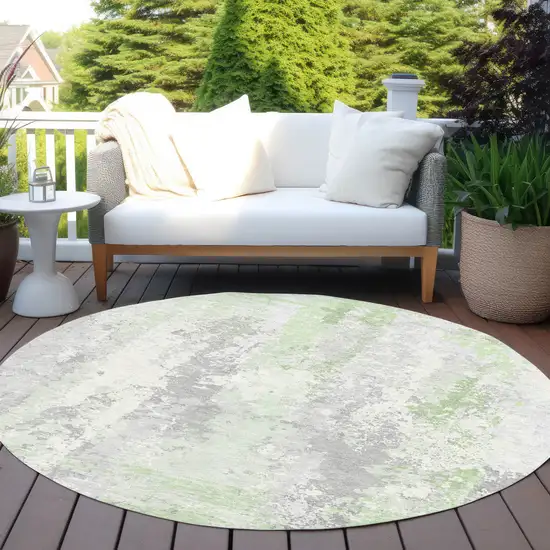 8' Artichoke Green And Ivory Round Abstract Washable Indoor Outdoor Area Rug Photo 5