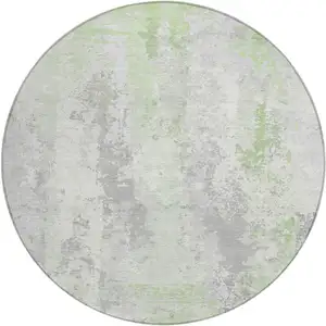 Photo of 8' Artichoke Green And Ivory Round Abstract Washable Indoor Outdoor Area Rug