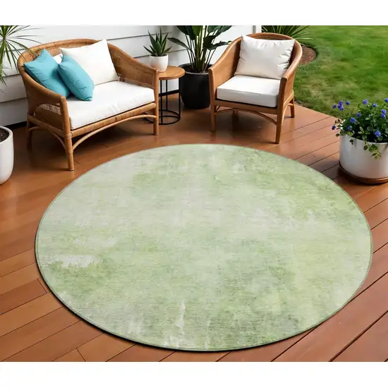 8' Artichoke Green And Ivory Round Abstract Washable Indoor Outdoor Area Rug Photo 2